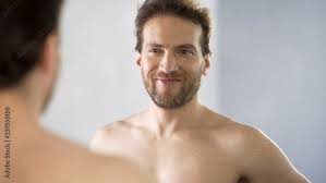 REFLECTIONS OF MIDDLE AGED MAN